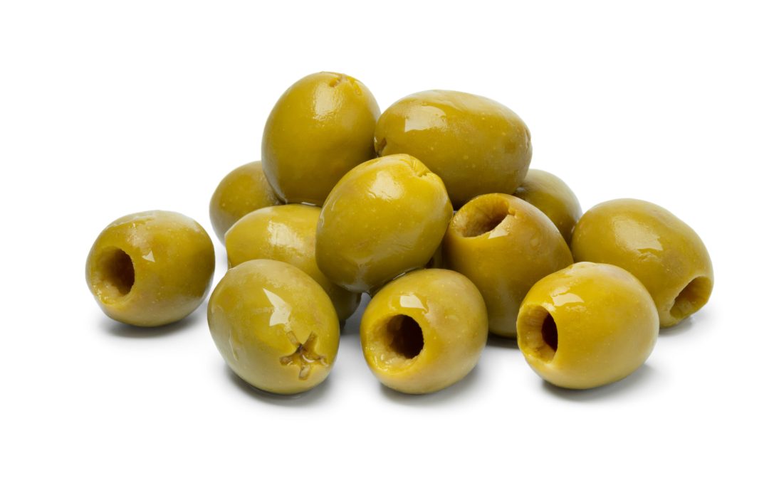 Pitted green olives as an ingredient for cooking